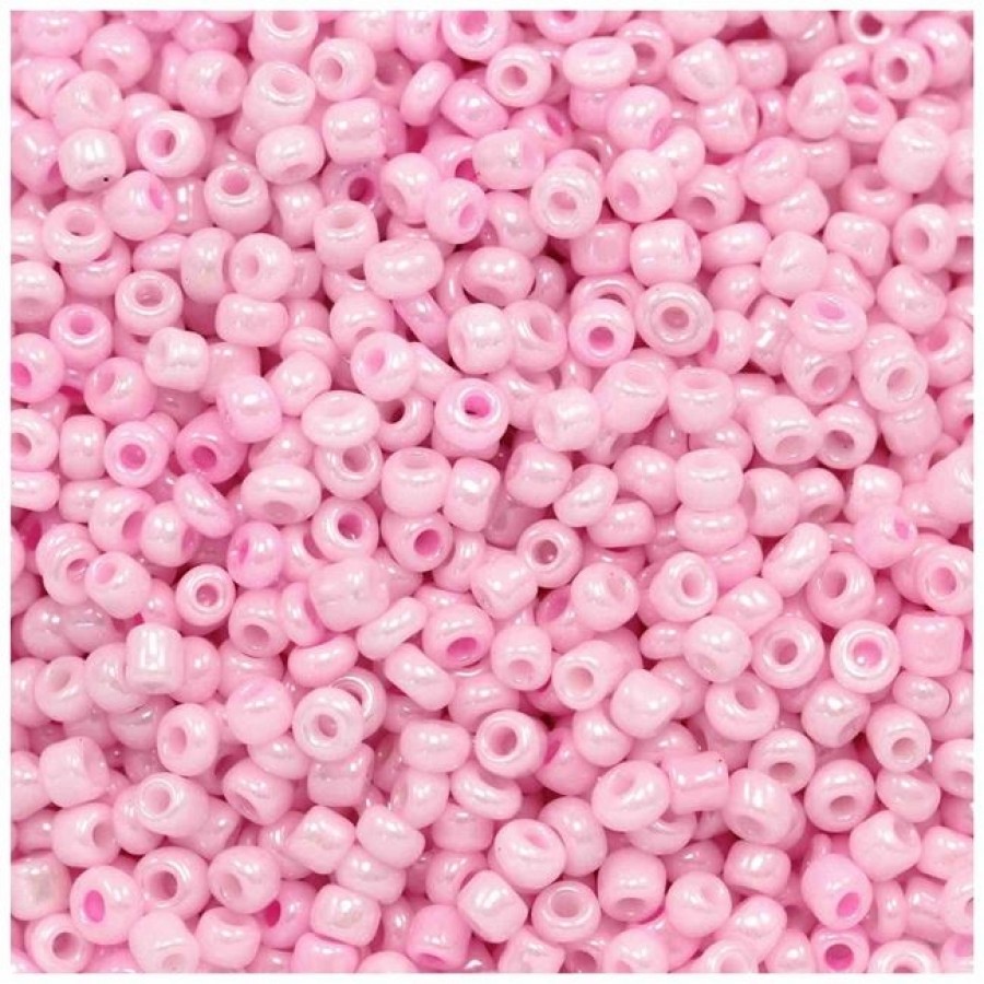 Γυάλινη χάντρα ροκάι No8 (~2,9mm) σε παστέλ ροζ περλέ χρώμα, κατάλληλη για την κατασκευή κοσμημάτων- τιμή ανά συσκευασία 20 γραμμ.