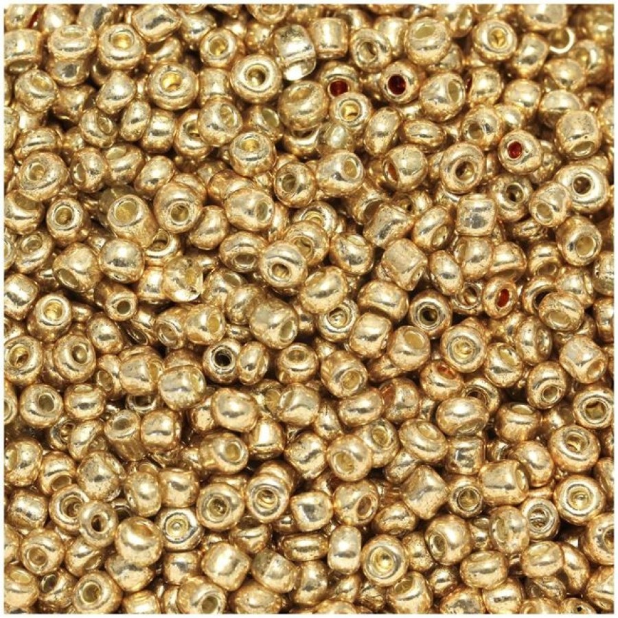 Γυάλινη χάντρα ροκάι No8 (~2,9mm) σε έντονο χρυσό μεταλλικό χρώμα, κατάλληλη για την κατασκευή κοσμημάτων- τιμή ανά συσκευασία 20 γραμμ.