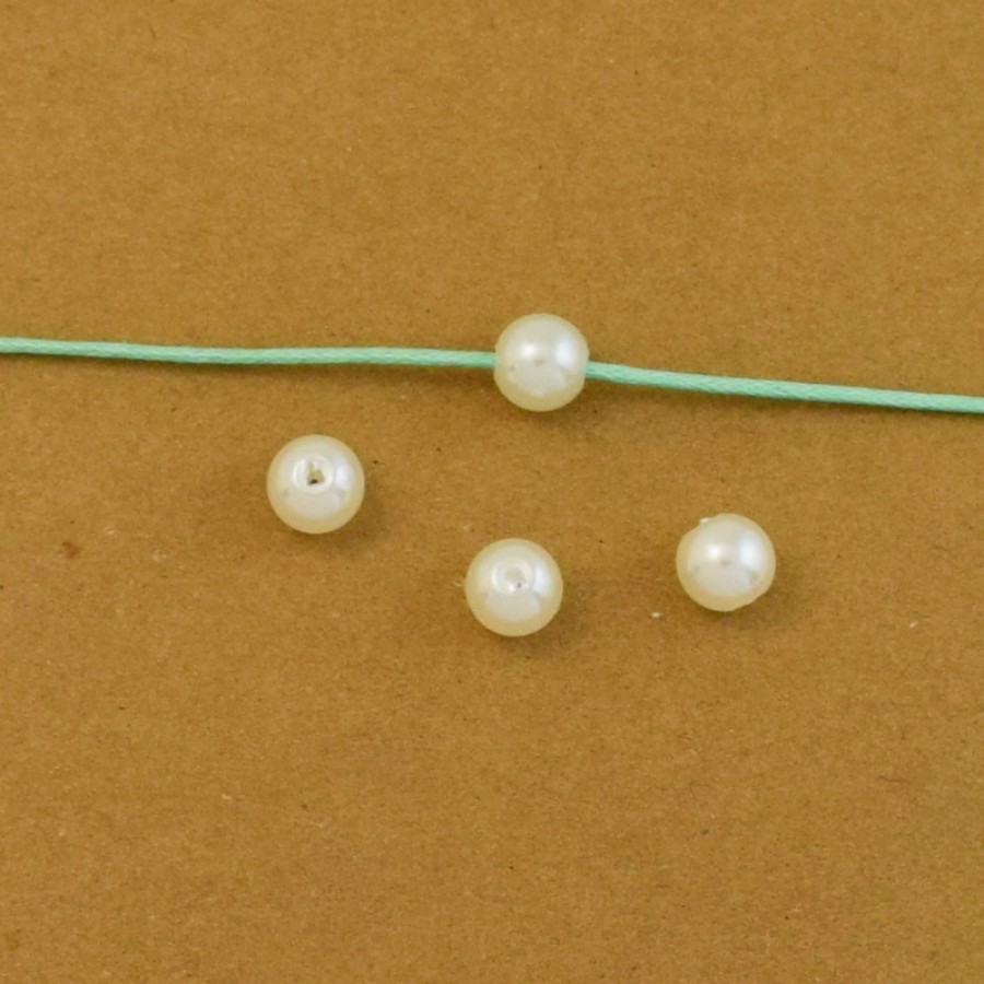 Στρογγυλή πέρλα 6mm σε λευκό χρώμα τιμη ανα σετ 5 τεμαχιων