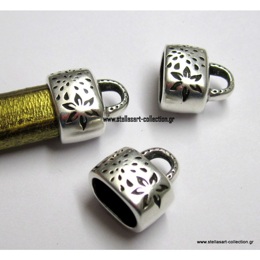 Τελειώματα ασημί 15 x14 mm με λεπτό κρίκο για χοντρό οβάλ δέρμα και καουτσουκ 10mm(regalliz) με ψιλό λουλουδάκι σαν σχέδιο     Η τιμή είναι για ένα τεμάχιο (ένα κομμάτι)