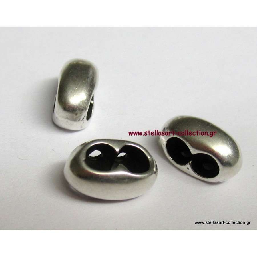 Μεταλλικος κρικος διαχωριστικος 6 x 12 mm σε ασημί αντικέ που χωραει δύο κορδόνια πάχους εως 4 mm     τιμη ανα τεμάχιο