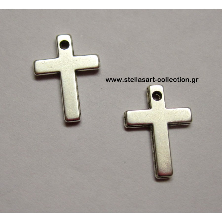 Μεταλλικός ασημί σταυρός 10x14mm με τρύπα για να περάσει κρικάκι ή κορδόνι.     καταλληλος και για μαρτυρικά     τιμή ανα τεμάχιο