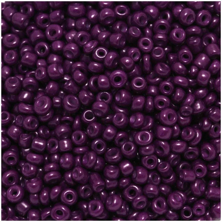 Γυάλινη χάντρα ροκάι No12 (~1,9mm) σε σκούρο μωβ χρώμα, κατάλληλη για την κατασκευή κοσμημάτων-τιμή ανά συσκευασία 20 γραμμ.