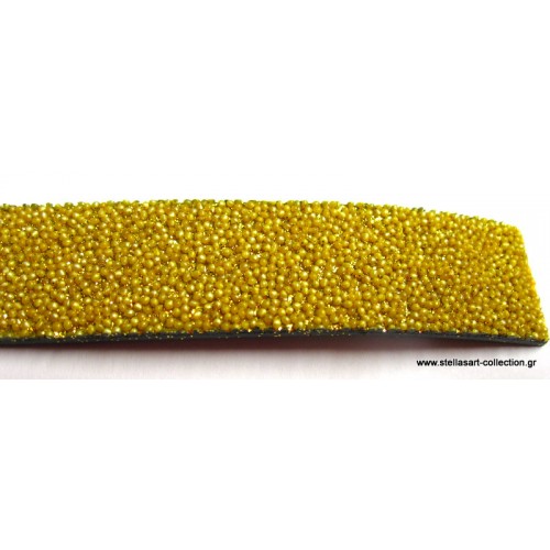 Πλακέ δέρμα  φαρδύ 20mm μα αναγλυφη υφή(χαβιάρι) σε χρυσαφί     τιμη ανα τεμάχιο 18πόντων(cm)